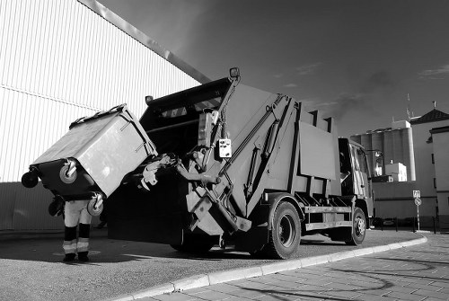 Rubbish removal team providing a transparent quote for household waste