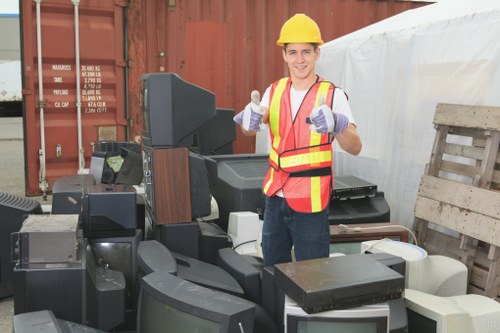 Local home clearance team removing furniture from a London property