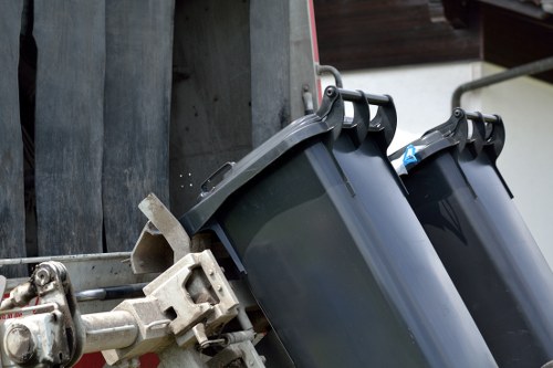 Staff assessing risks before rubbish removal begins