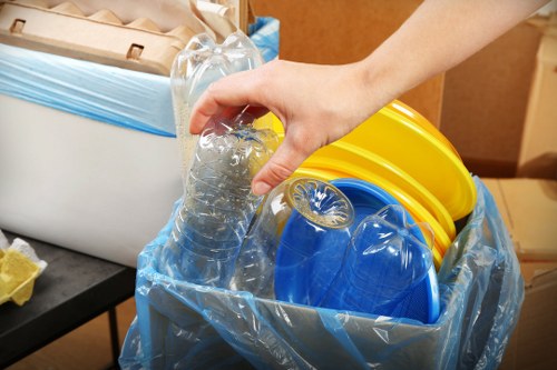 Worker wearing PPE during rubbish collection